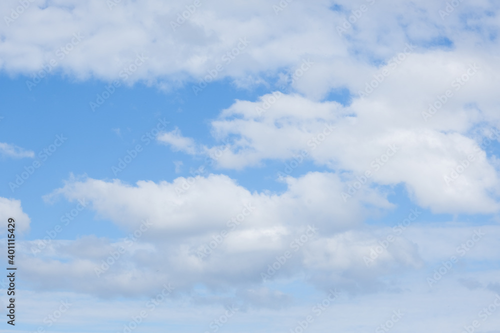 Fototapeta premium blue sky and airy white clouds, heavenly landscape