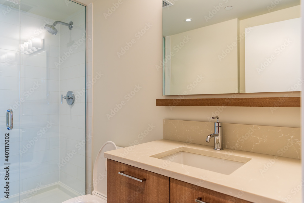 Fragment of an empty bright, clean bathroom in a luxury house. Fragment of an empty bright, clean bathroom in a luxury house.