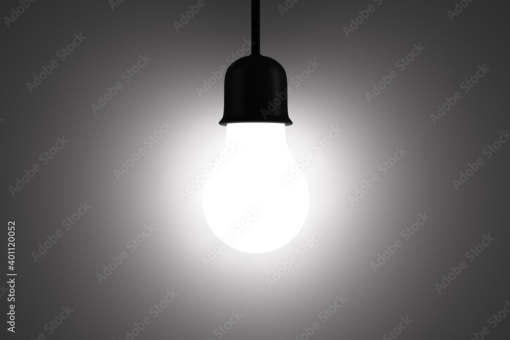 A brightly glowing light bulb. Close-up. A brightly glowing light bulb. Close-up.