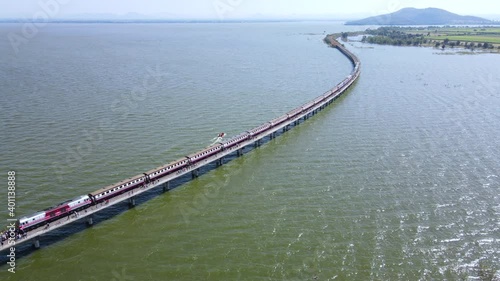Wallpaper Mural Aerial view point of interest, Thailand Excursion train parked on the floating railway bridge with blue sky in the lake of "Pa Sak Jolasid dam" at Lopburi province, amazing Thailand. Torontodigital.ca