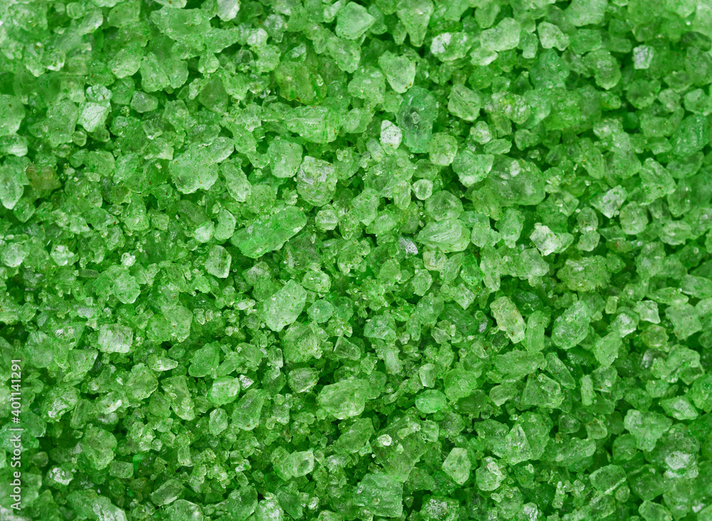 background from bath salts, emerald color. relaxation rest and treatment concept. background from bath salts, emerald color. relaxation rest and treatment concept.