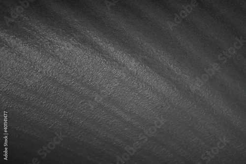 Dark gray abstract background for design. Surface for decoration.