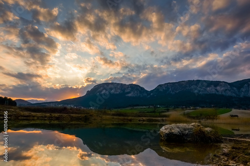 beautiful landscape with mountain and clouds on the sky with reflection