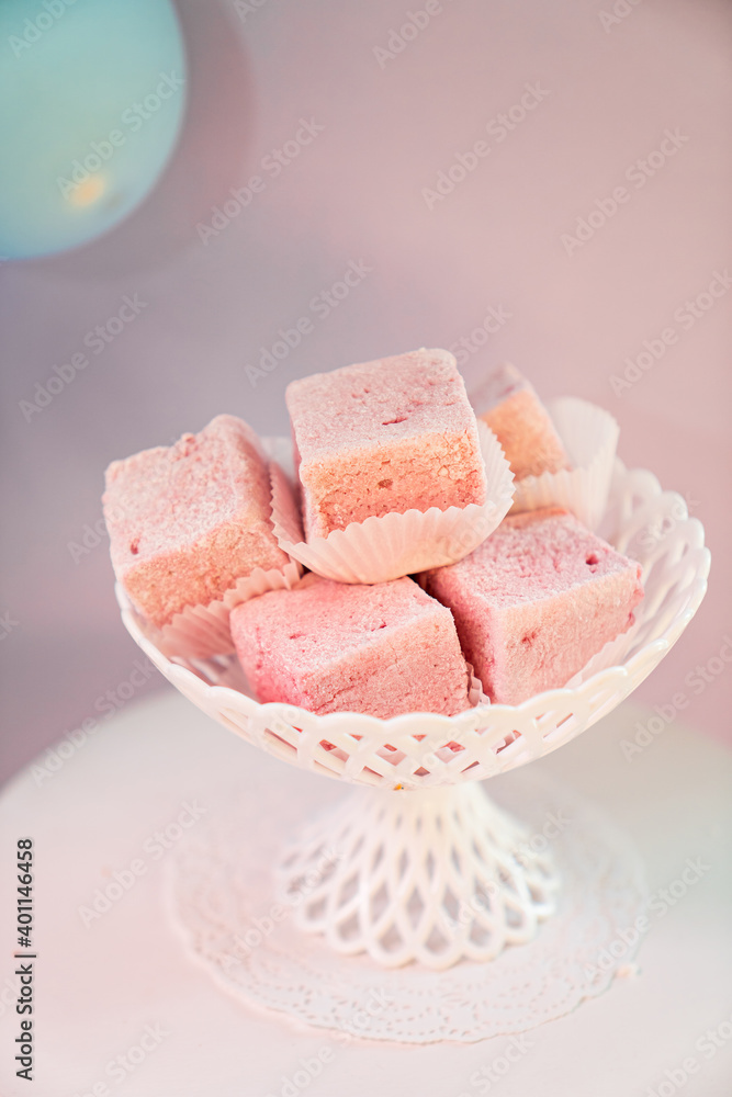 pink marshmallow in white vase. sweet treat for holiday.