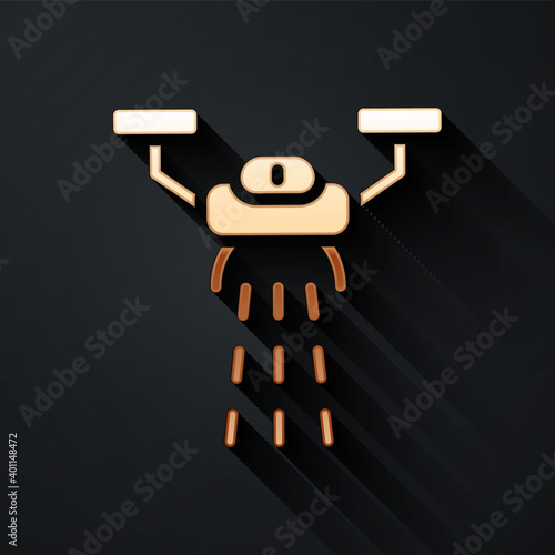 Gold Smart farm with drone control for seed planting icon isolated on black background. Innovation technology for agricultural company. Long shadow style. Vector.