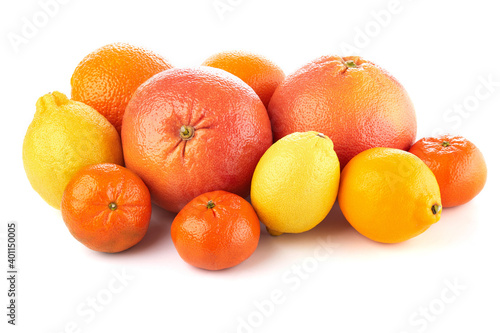 Fruit composition. Group of citrus: orange, lemon, mandarine tangerine, grapefruit. full, half and slices on white background, macro close-up