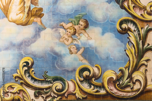 wall covered with azulejos of religious inspiration inside the church of Valega district of Aveiro, Portugal