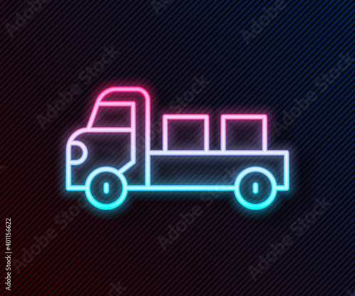 Glowing neon line Pickup truck icon isolated on black background. Vector.