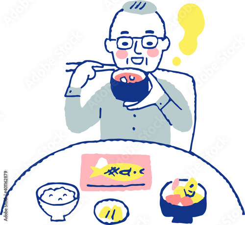 食事をする高齢男性