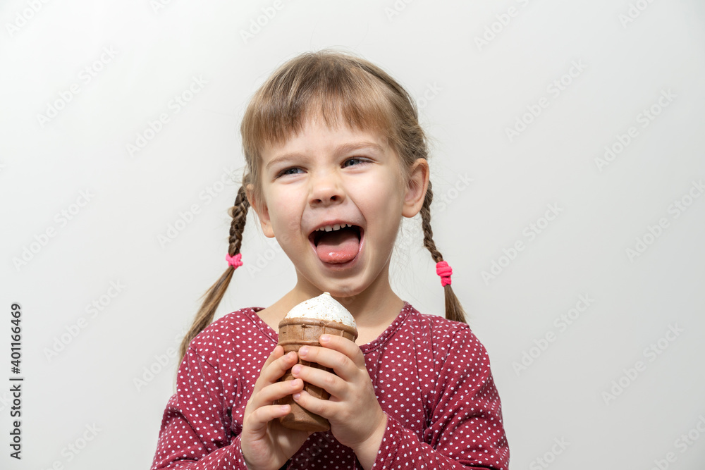 cute little caucasian girl eating ice cream