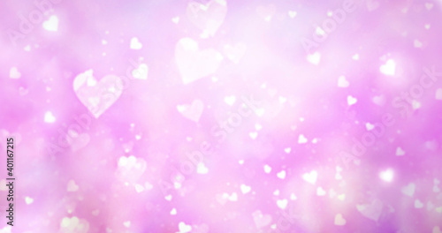 Valentine's day. Defocused lights in the form of hearts. Lights Abstract Background 