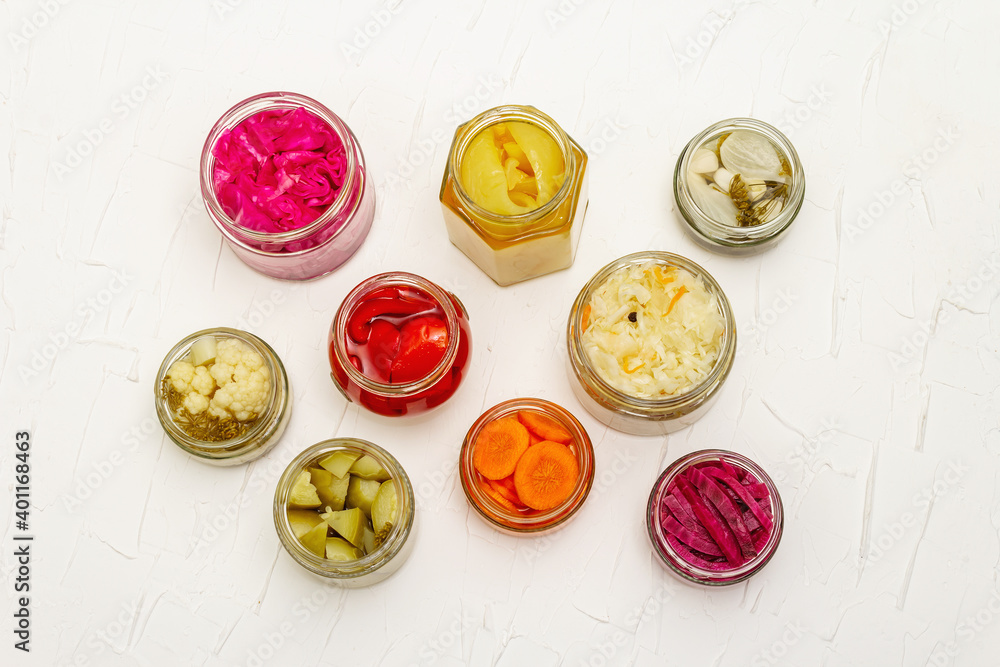 Assorted of fermented vegetables in glass jars Assorted of fermented vegetables in glass jars