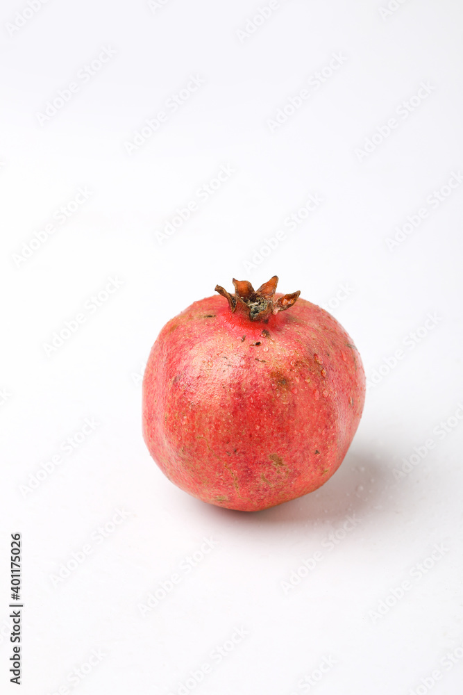 Fresh pomegranate fruit on white background Fresh pomegranate fruit on white background