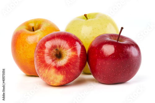 Fresh fruits: different colorful apples isolated on white background macro close up. 
