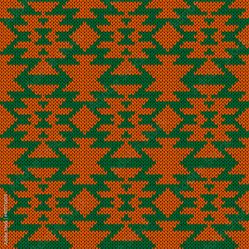 Knitting seamless vector pattern as a fabric texture in green and orange color as a fabric texture
