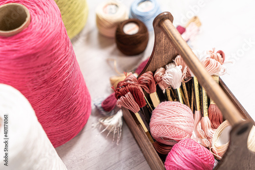 Threads in reels. Colored bobbins for embroidery knitting hobby accessories creativity.