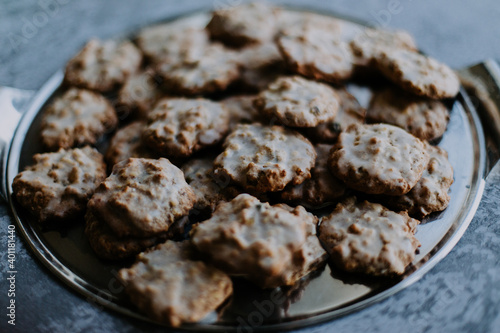 homemade gingerbread baked cookies with glazing sugar closeup photo german traditional biscuits for christmas time