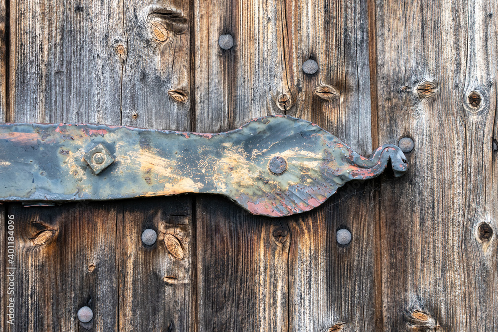 wooden door of a characteristic stable for German moorland sheep in the natural preserve Lueneburger Heide wooden door of a characteristic stable for German moorland sheep in the natural preserve Lueneburger Heide