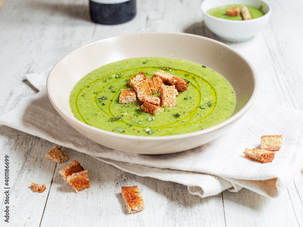 Zucchini and potato soup with bread croutons Zucchini and potato soup with bread croutons