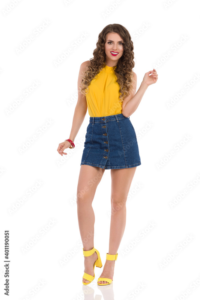 Happy Young Woman In Jeans Mini Skirt And High Heels Happy Young Woman In Jeans Mini Skirt And High Heels