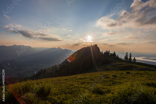 Mountain Zwoelferspitz with sunset at lake Chiemsee in Bavaria, Germany photo