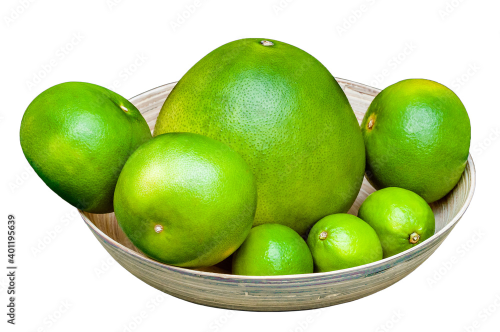 Isolated plate with green citruses fruits. Cutout set of limes, pomelo, grapefruits on white background. Isolated plate with green citruses fruits. Cutout set of limes, pomelo, grapefruits on white background.