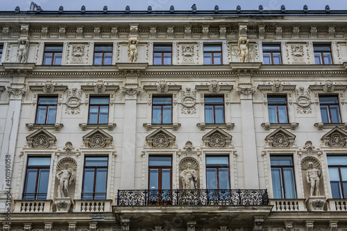 Architectural details of old picturesque dwelling house at Reichsrats street (Reichsratsstrasse) in the historic center of Vienna. Vienna, Austria. © dbrnjhrj