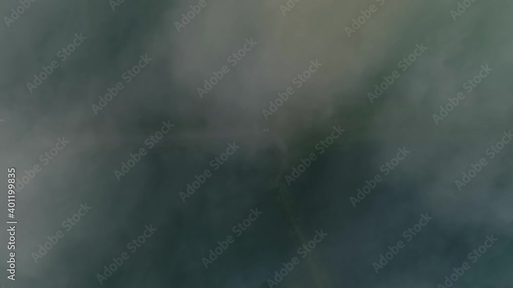 Aerial top-down rising over clouds. Frydman, Poland. Aerial top-down rising over clouds. Frydman, Poland.