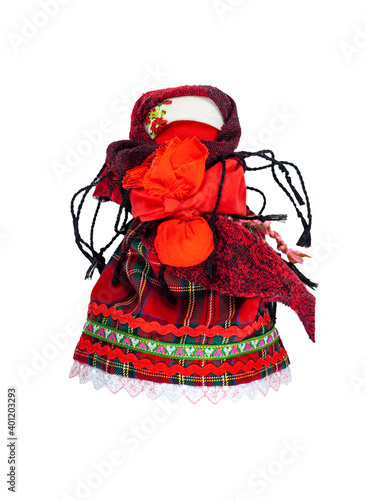 Traditional home-made Russian doll made of fabric. A doll with a child in her arms. photo