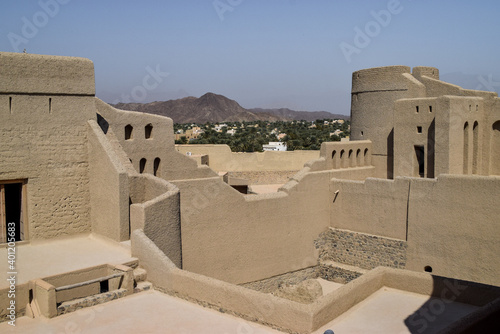 The beautiful walls of Bahla Fort in contrast with the blue sky. Bahla, Oman.