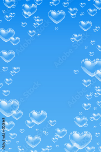 Heart shaped bubbles underwater on blue background