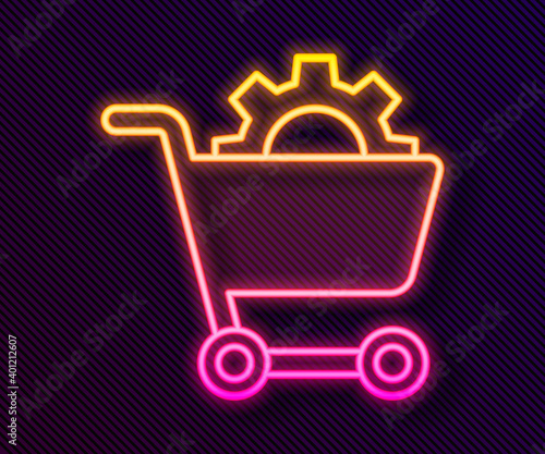 Glowing neon line Shopping cart icon isolated on black background. Online buying concept. Delivery service. Supermarket basket. Vector.