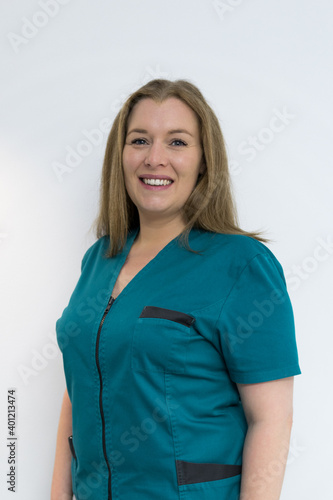 Female doctor posing in a dentist office