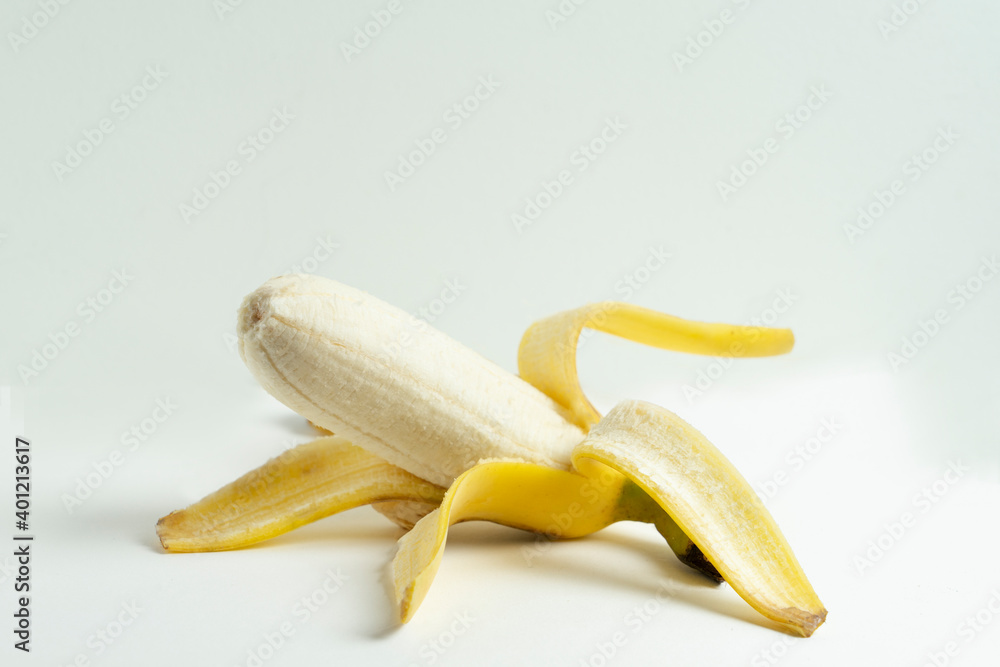 Close up open yellow banana isolated on white background Close up open yellow banana isolated on white background