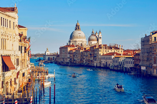 The view on the сathedral of "Santa Maria della Salute" from the bridge of "Ponte dell'Accademia" throw the Grand canal in the City of Venice
