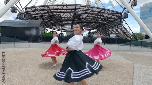 Women dancing Mexican folk dance, Mujeres bailando danza folclorica, Polka Sinaloa - Puebla Mexico photo