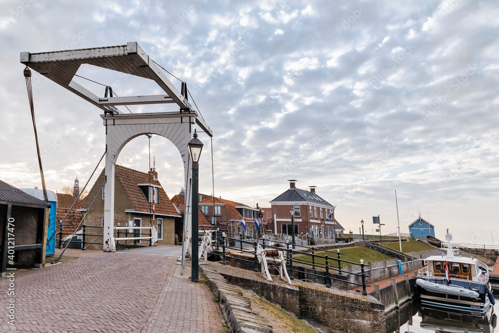 Old sluice and buildings in Hindeloopen, Netherlands Old sluice and buildings in Hindeloopen, Netherlands
