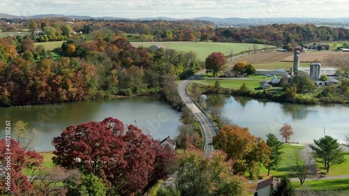 Speedwell Forge Lake in Lititz Pennsylvania, USA. Aerial of Lancaster County PA nature preserve and rural farmland among rolling hills. photo