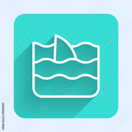 White line Shark fin in ocean wave icon isolated with long shadow. Green square button. Vector.