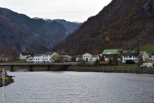 Wallpaper Mural beautiful calm scenery of  norway tradition houses and bridge with snow mountain ranges in aurlandfjord norway scandinevian europe in winter Torontodigital.ca