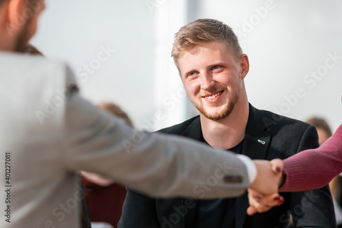 Manager and the applicant shaking hands during the interview