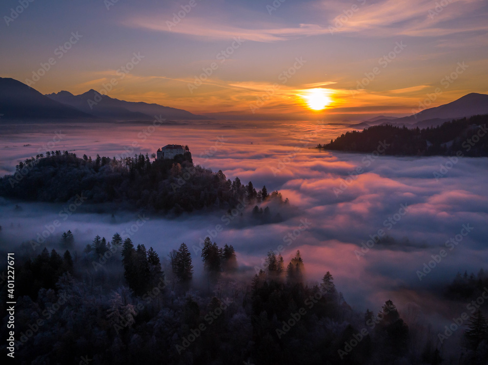 Sunrise, a sea of clouds and Bled Castle