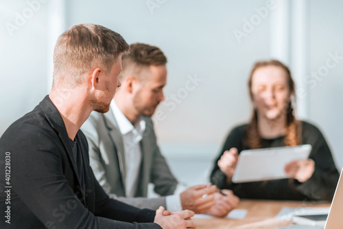 close up. business team discussing the plans for the new project © yurolaitsalbert