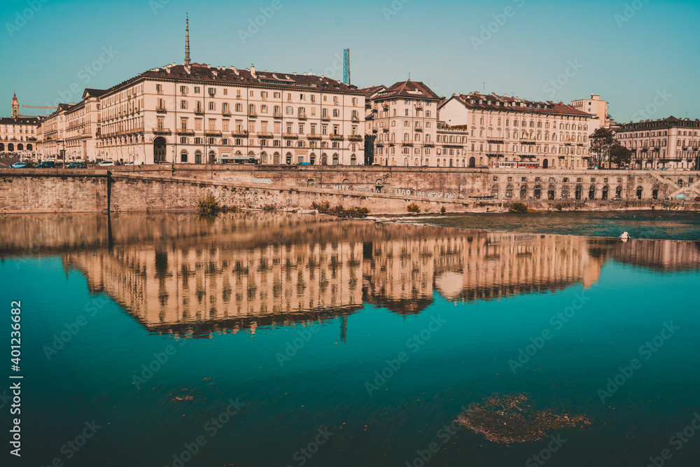 City of Turin, Baroque buildings and ancient cafes line the avenues and grandiose Turin squares, such as Piazza Castello and Piazza San Carlo. Nearby the Mole Antonelliana, Italy October 2018