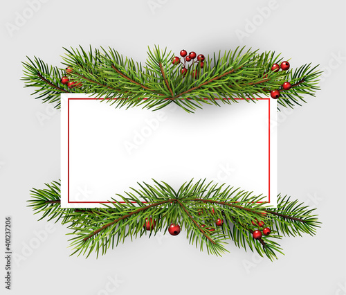 Square frame with spruce branches.