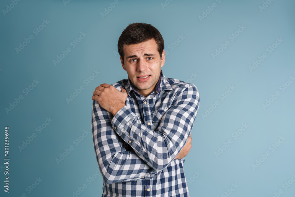 Portrait of handsome sick cold man standing Portrait of handsome sick cold man standing