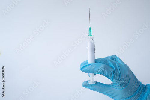 syringe close up. copy space for text. covid-19 vaccination. medicine, healthcare and pandemic concept disease, medical gloves, injection, inject vaccine mutation new strain of coronavirus Covid-2020.