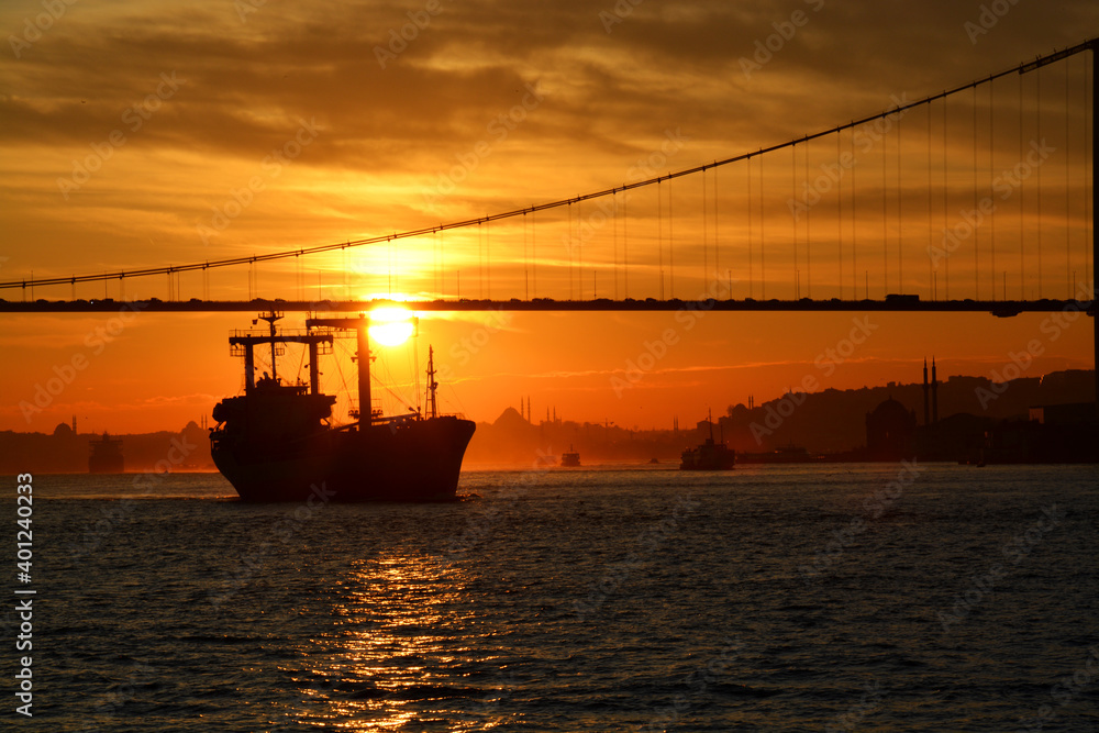 sunset at the sea with ship