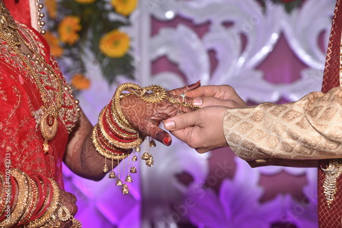 Ring Ceremony -  A Hindu wedding ritual wherein couples guve ring to each other.  Rings are worn in the Ring finger which is said to have a direct link with heart. © Shashank