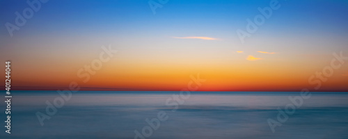 Fotografie Blue and orange sky after sunset over the Gulf of Mexico from Venice Florida USA